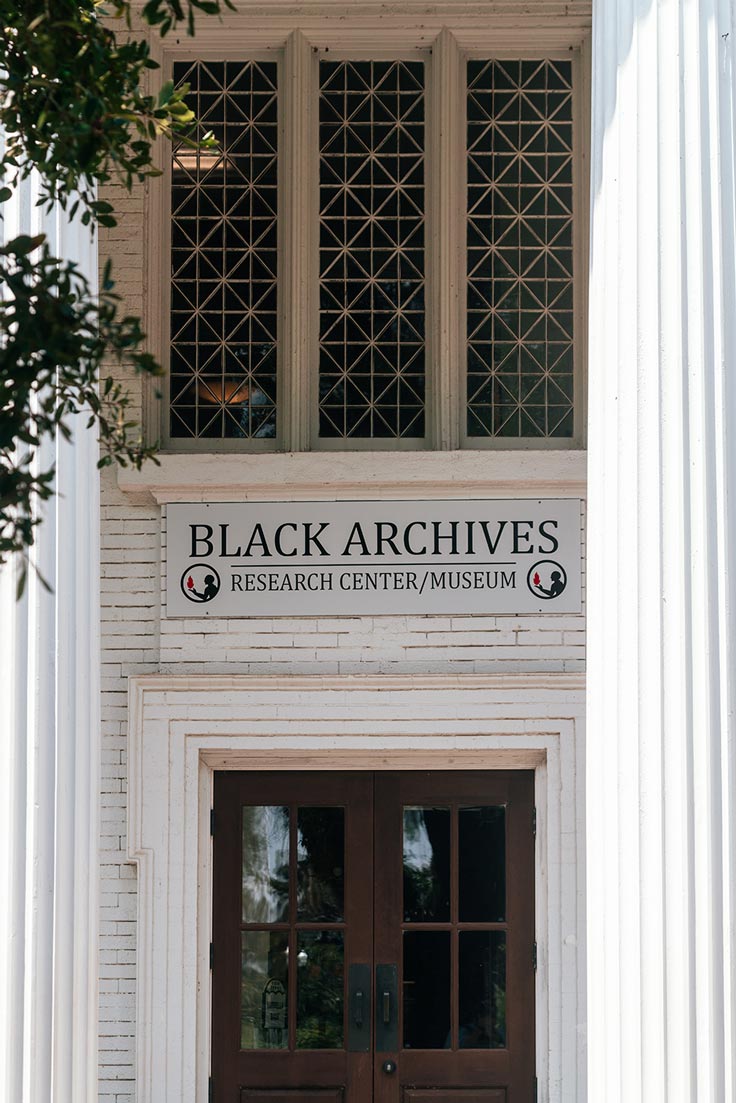 words on above the door, black archives and museum