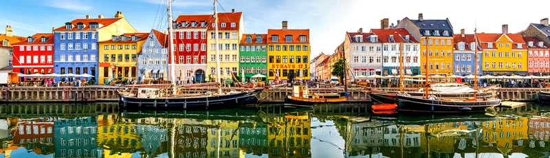 colorful scandinavian buildings on canal