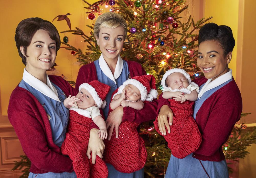 Midwives holding babies