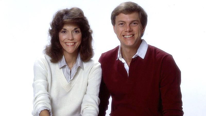 Blue logo for the Carpenters