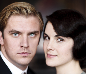 A man and woman facing the camera