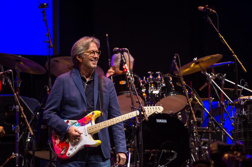 Man playnig guitar on stage