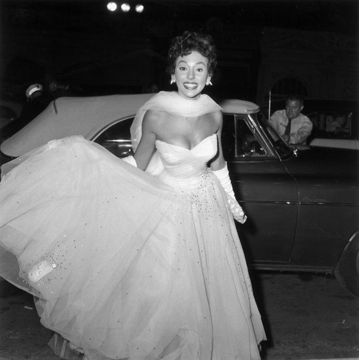 woman in ball gown - black and white photo from the 50s or 60s