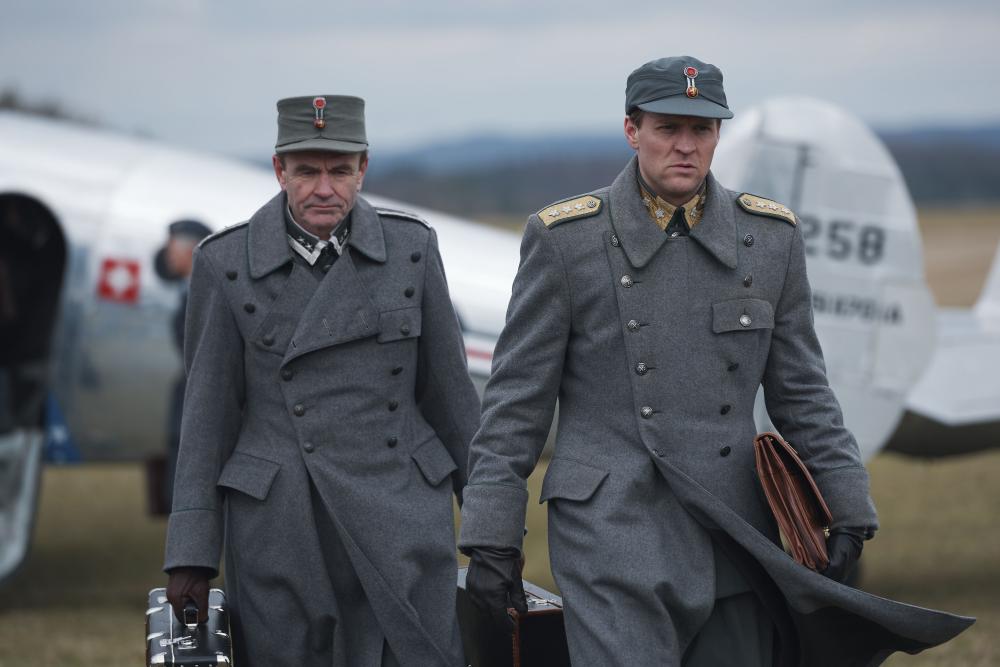 Two generals in front of a plane