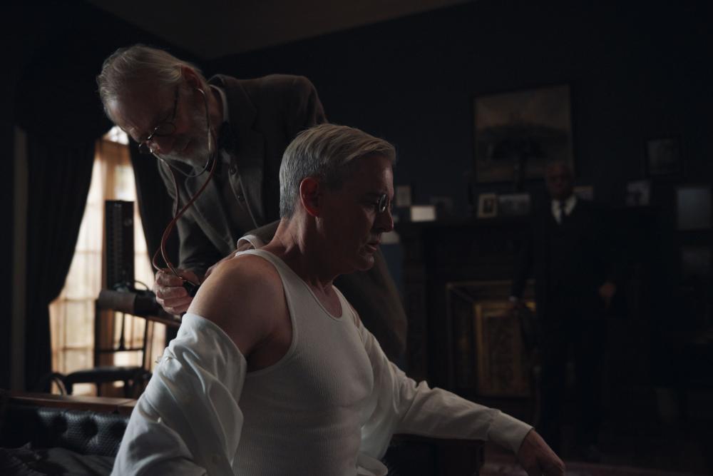 A doctor checking on a patient