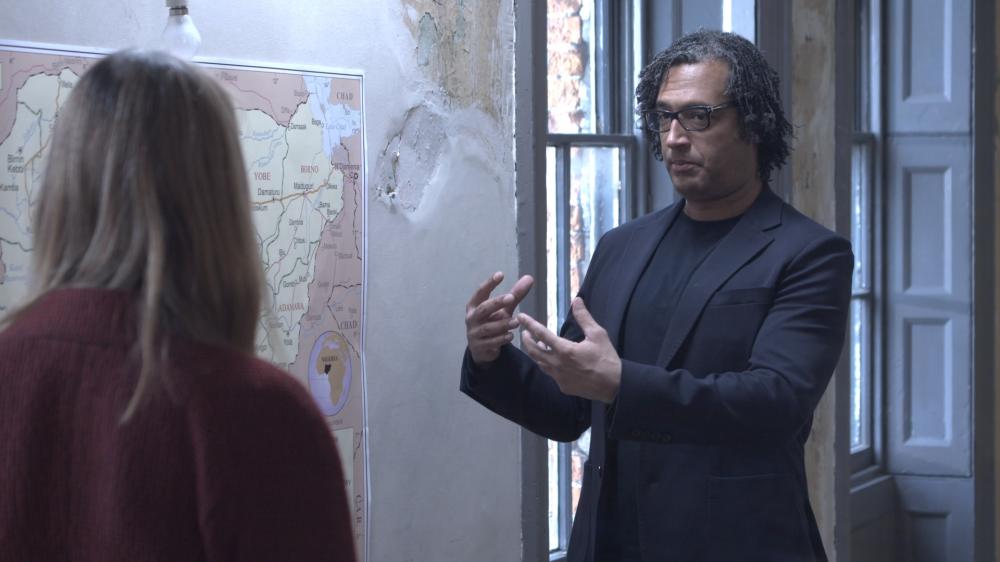 A man explaining something